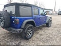 2020 Jeep Wrangler Unlimited — photo 4 of 16 | VIN 1C4HJXFN3LW219113