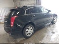 2016 Cadillac SRX — photo 4 of 16 | VIN 3GYFNBE3XGS554735