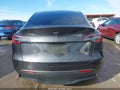 2024 Tesla Model Y — photo 16 of 19 | VIN 7SAYGDED7RF087317