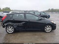 2013 Hyundai Accent — photo 14 of 17 | VIN KMHCU5AE9DU087027