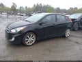 2013 Hyundai Accent — photo 15 of 17 | VIN KMHCU5AE9DU087027