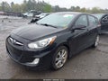 2013 Hyundai Accent — photo 2 of 17 | VIN KMHCU5AE9DU087027