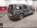 2011 Nissan Armada — photo 4 of 17 | VIN 5N1AA0NCXBN602412