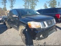 2015 Nissan Titan — photo 1 of 16 | VIN 1N6BA0EC0FN512360