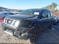2015 Nissan Titan — photo 2 of 16 | VIN 1N6BA0EC0FN512360