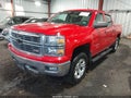 2014 Chevrolet Silverado 1500 — photo 2 of 16 | VIN 3GCUKREC2EG287928