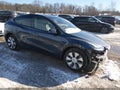 2023 Tesla Model Y — photo 1 of 19 | VIN 7SAYGDEE0PA157310
