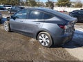 2023 Tesla Model Y — photo 3 of 19 | VIN 7SAYGDEE0PA157310