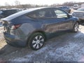 2023 Tesla Model Y — photo 4 of 19 | VIN 7SAYGDEE0PA157310