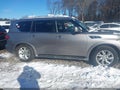2012 Infiniti QX56 — photo 13 of 16 | VIN JN8AZ2NE2C9021043