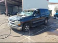 2003 Chevrolet Tahoe — photo 2 of 11 | VIN 1GNEC13V73J188127