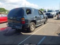 2003 Chevrolet Tahoe — photo 4 of 11 | VIN 1GNEC13V73J188127