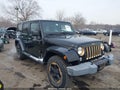 2014 Jeep Wrangler Unlimited — photo 1 of 17 | VIN 1C4HJWEG7EL165154