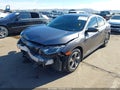 2019 Honda Civic — photo 2 of 17 | VIN 19XFC2F66KE035256