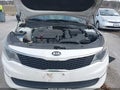 2016 Kia Optima — photo 10 of 16 | VIN 5XXGT4L33GG059099