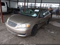 2004 Toyota Corolla — photo 2 of 11 | VIN 1NXBR32E74Z203079