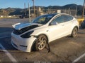 2024 Tesla Model Y — photo 2 of 17 | VIN 7SAYGDEE5RF090886