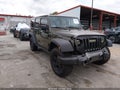 2016 Jeep Wrangler Unlimited — photo 1 of 16 | VIN 1C4BJWDG1GL105168