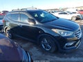 2017 Hyundai Santa Fe — photo 13 of 16 | VIN 5NMZUDLB0HH044642