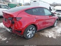 2023 Tesla Model Y — photo 4 of 17 | VIN 7SAYGAEE4PF780494