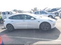 2023 Tesla Model 3 — photo 13 of 16 | VIN 5YJ3E1EA7PF464713