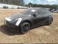 2023 Tesla Model Y — photo 2 of 22 | VIN 7SAYGDEF5PF659726