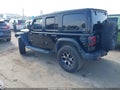 2021 Jeep Wrangler Unlimited — photo 3 of 17 | VIN 1C4JJXFM8MW617900