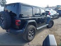 2021 Jeep Wrangler Unlimited — photo 4 of 17 | VIN 1C4JJXFM8MW617900