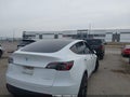 2021 Tesla Model Y — photo 4 of 16 | VIN 5YJYGDEE9MF278252