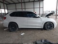 2015 BMW X5 — photo 14 of 17 | VIN 5UXKR2C50F0H38957