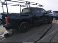 2023 Toyota Tundra — photo 4 of 17 | VIN 5TFNA5DB2PX065011