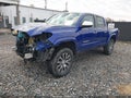 2022 Toyota Tacoma — photo 2 of 19 | VIN 3TMGZ5AN6NM519165