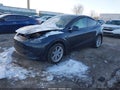 2024 Tesla Model Y — photo 2 of 16 | VIN 7SAYGDEE7RA254927