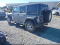 2014 Jeep Wrangler Unlimited — photo 3 of 16 | VIN 1C4HJWDG3EL260764