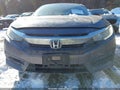 2016 Honda Civic — photo 12 of 16 | VIN 19XFC2F58GE204045