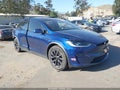 2024 Tesla Model X — photo 1 of 23 | VIN 7SAXCBE57RF444161
