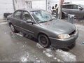 2003 Kia Spectra — photo 1 of 12 | VIN KNAFB121835213640