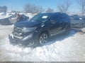 2018 Honda CR-V — photo 2 of 17 | VIN 7FARW2H9XJE006657