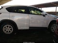 2016 Mazda CX-5 — photo 13 of 16 | VIN JM3KE4CYXG0865949