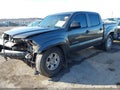 2015 Toyota Tacoma — photo 2 of 16 | VIN 3TMLU4EN5FM192440