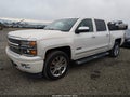 2015 Chevrolet Silverado 1500 — photo 2 of 16 | VIN 3GCUKTEC9FG317571