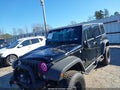 2016 Jeep Wrangler Unlimited — photo 6 of 16 | VIN 1C4BJWFGXGL154057