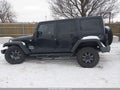 2015 Jeep Wrangler Unlimited — photo 14 of 16 | VIN 1C4BJWDG7FL761115