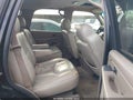 2004 Chevrolet Tahoe — photo 8 of 16 | VIN 1GNEC13Z54R208574