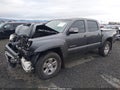 2014 Toyota Tacoma — photo 2 of 17 | VIN 3TMLU4EN8EM154490