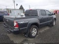 2014 Toyota Tacoma — photo 4 of 17 | VIN 3TMLU4EN8EM154490
