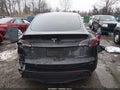 2025 Tesla Model Y — photo 16 of 18 | VIN 7SAYGDEE2SF304951