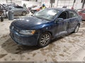 2014 Volkswagen Jetta — photo 2 of 16 | VIN 3VWD17AJXEM382392