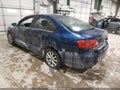 2014 Volkswagen Jetta — photo 3 of 16 | VIN 3VWD17AJXEM382392