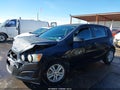 2014 Chevrolet Sonic — photo 14 of 16 | VIN 1G1JC6SH0E4218627